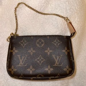 Authentic Louis Vuitton Mini Pochette
